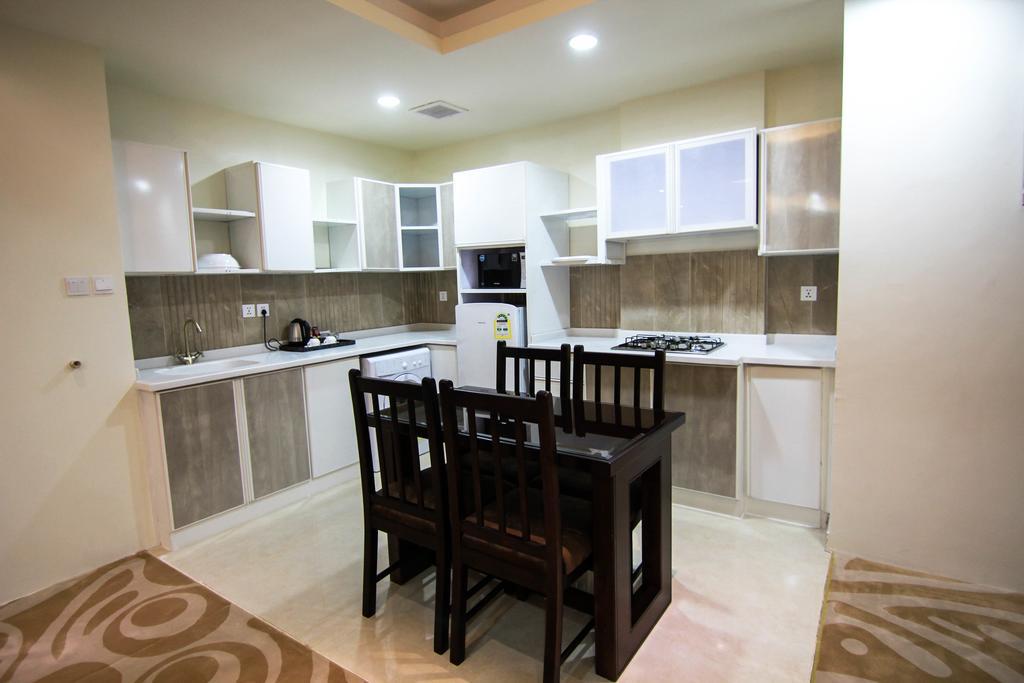 Rest Night Serviced Apartments- Alhamra Riade Exterior foto A modern kitchen