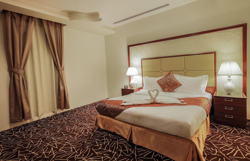 Rest Night Serviced Apartments- Alhamra Riade Exterior foto A bedroom at the hotel